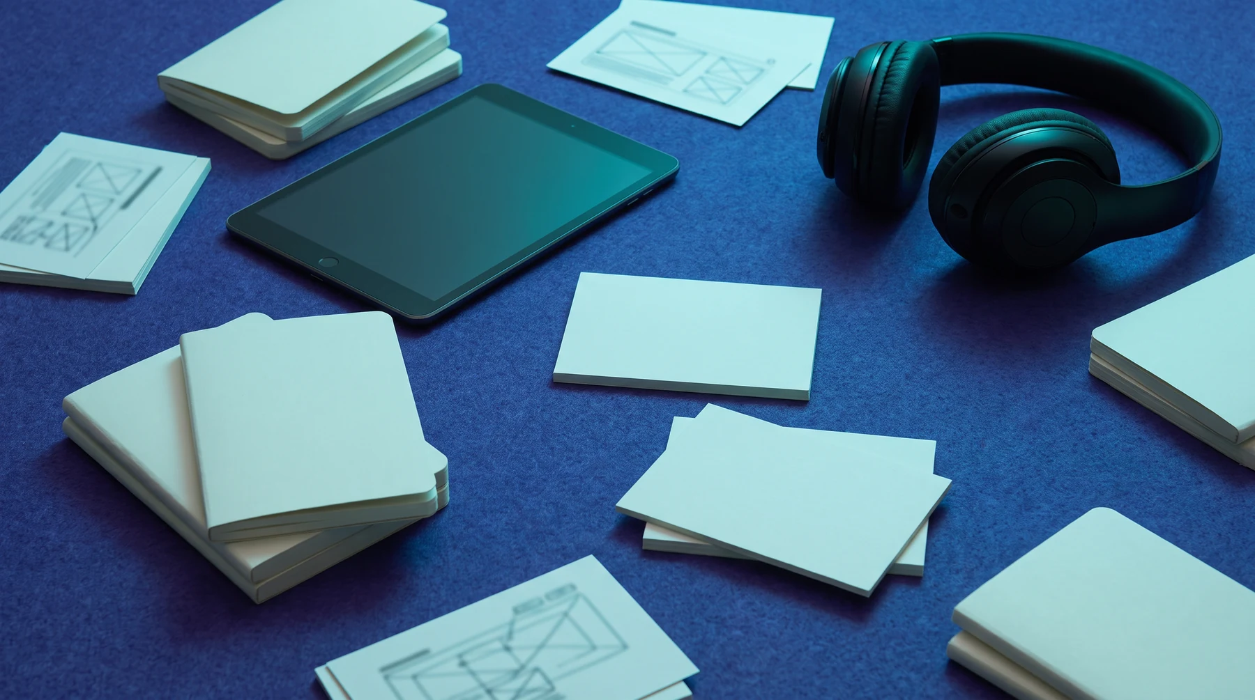 App research notes and headphones